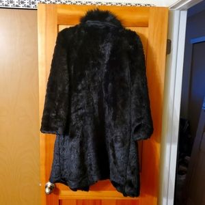 Beautiful faux fur coat. Excellent condition